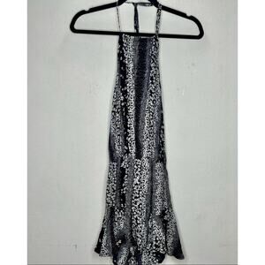 Olivaceous Black and White Floral Halter Tie Neck Open Back Flowy Romper Medium